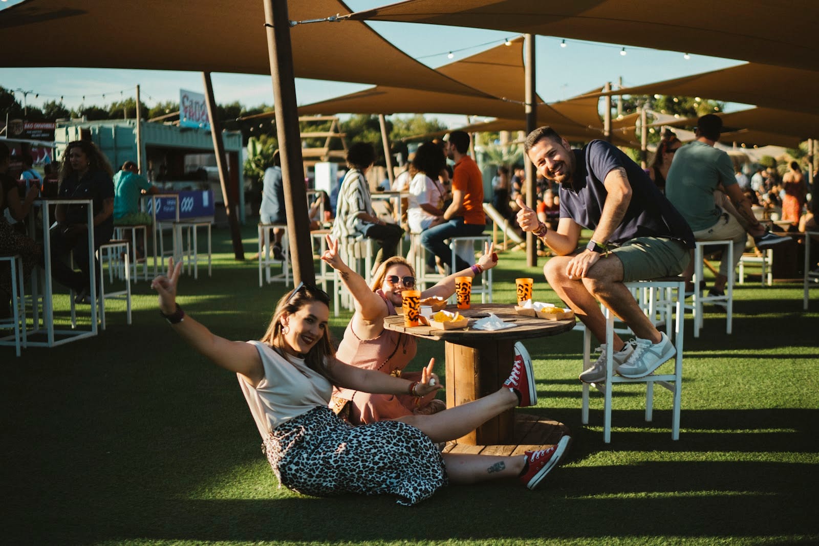 Outdoor guest area at Málaga Forum with people relaxing in an open-air event space